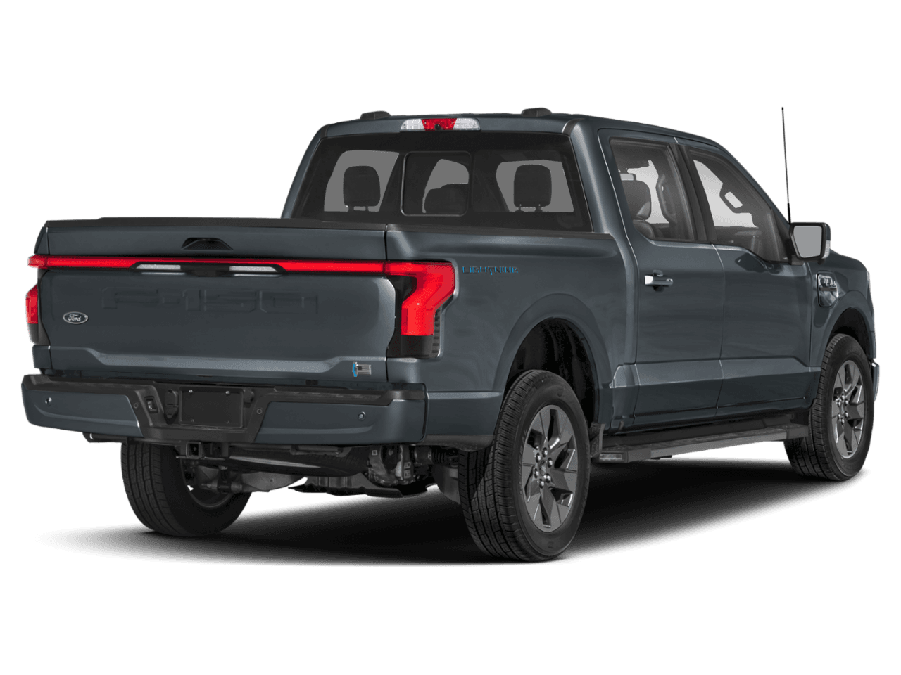 2022 Ford F-150 Lightning LARIAT - Rear 3/4, facing to the right