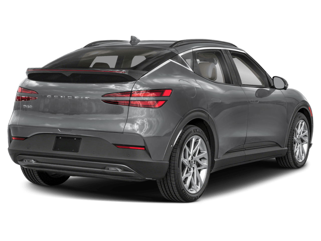 2023 Genesis GV60 Advanced - Rear 3/4, facing to the right