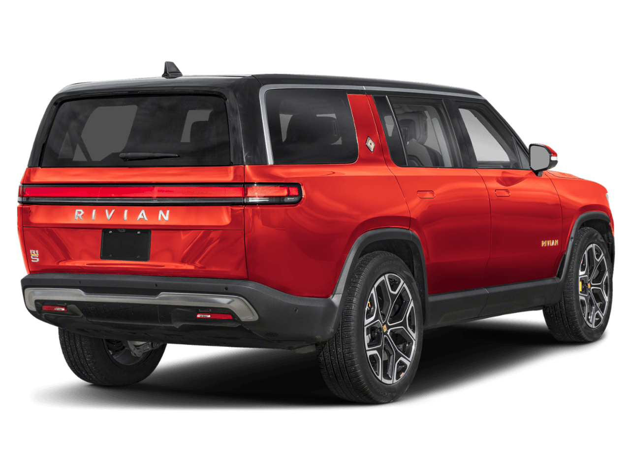 2025 Rivian R1S Adventure - Rear 3/4, facing to the right