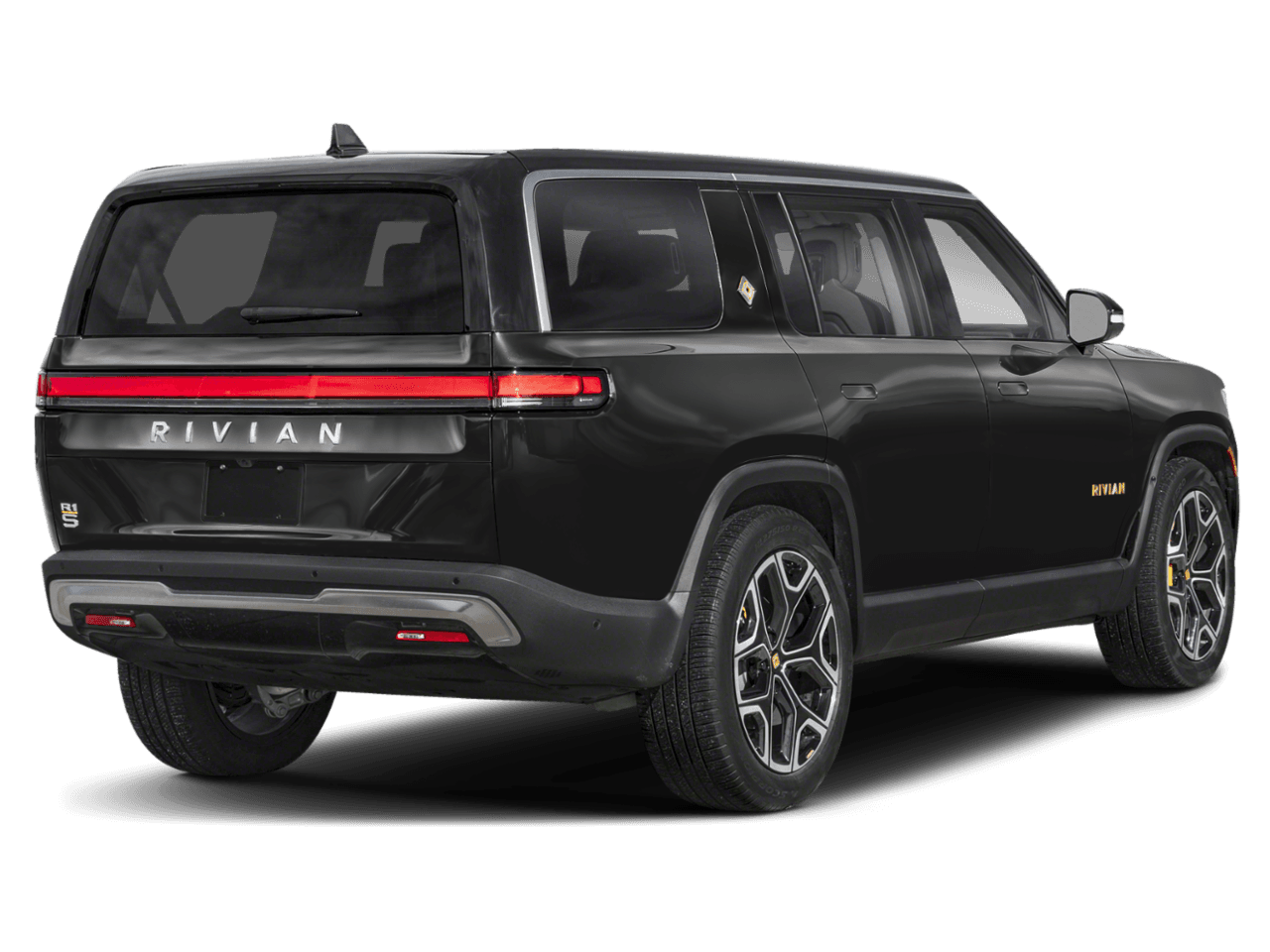 2025 Rivian R1S Adventure - Rear 3/4, facing to the right