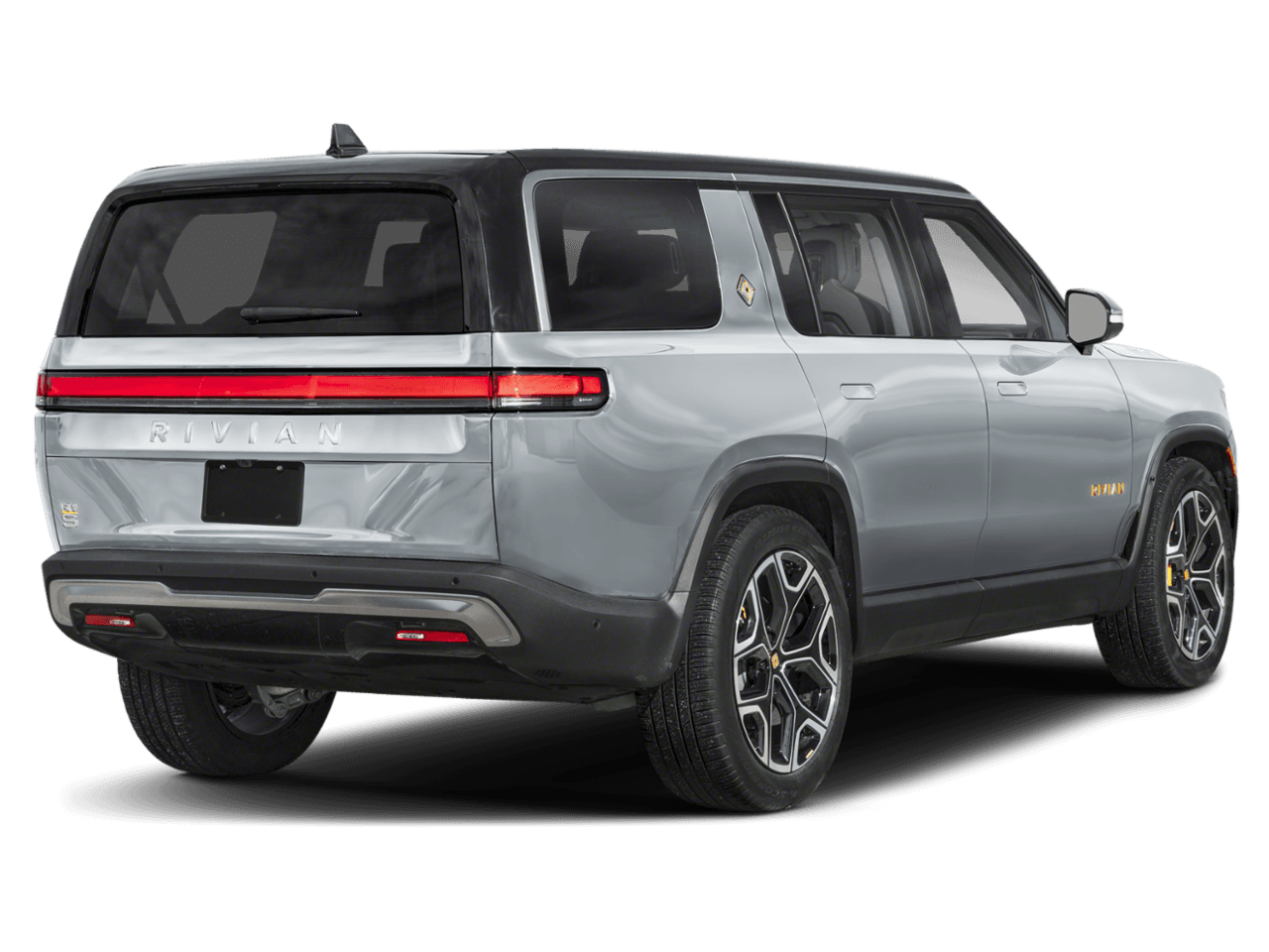 2025 Rivian R1S Adventure - Rear 3/4, facing to the right