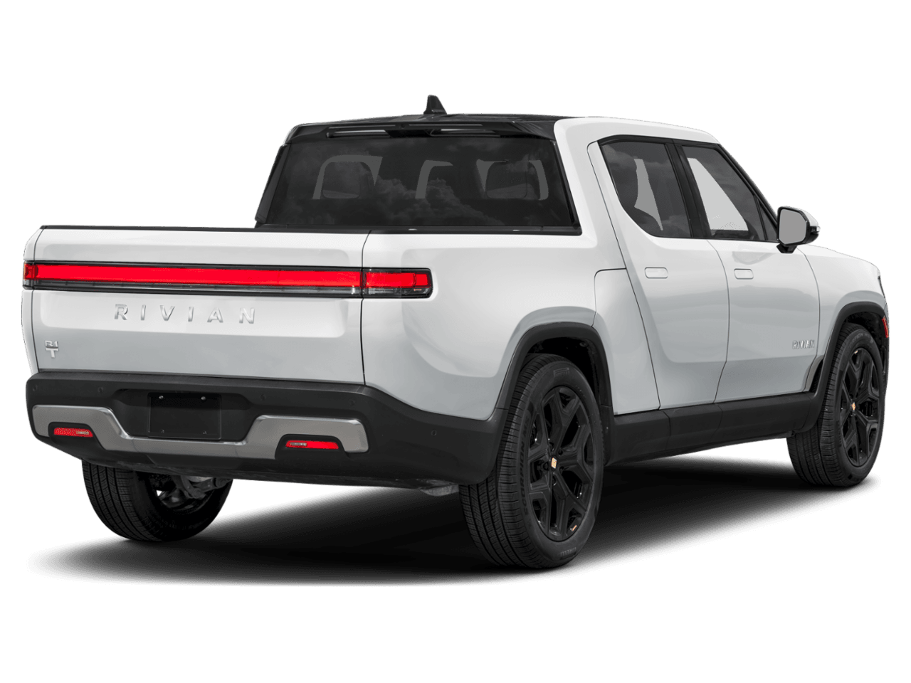 2025 Rivian R1T Adventure - Rear 3/4, facing to the right