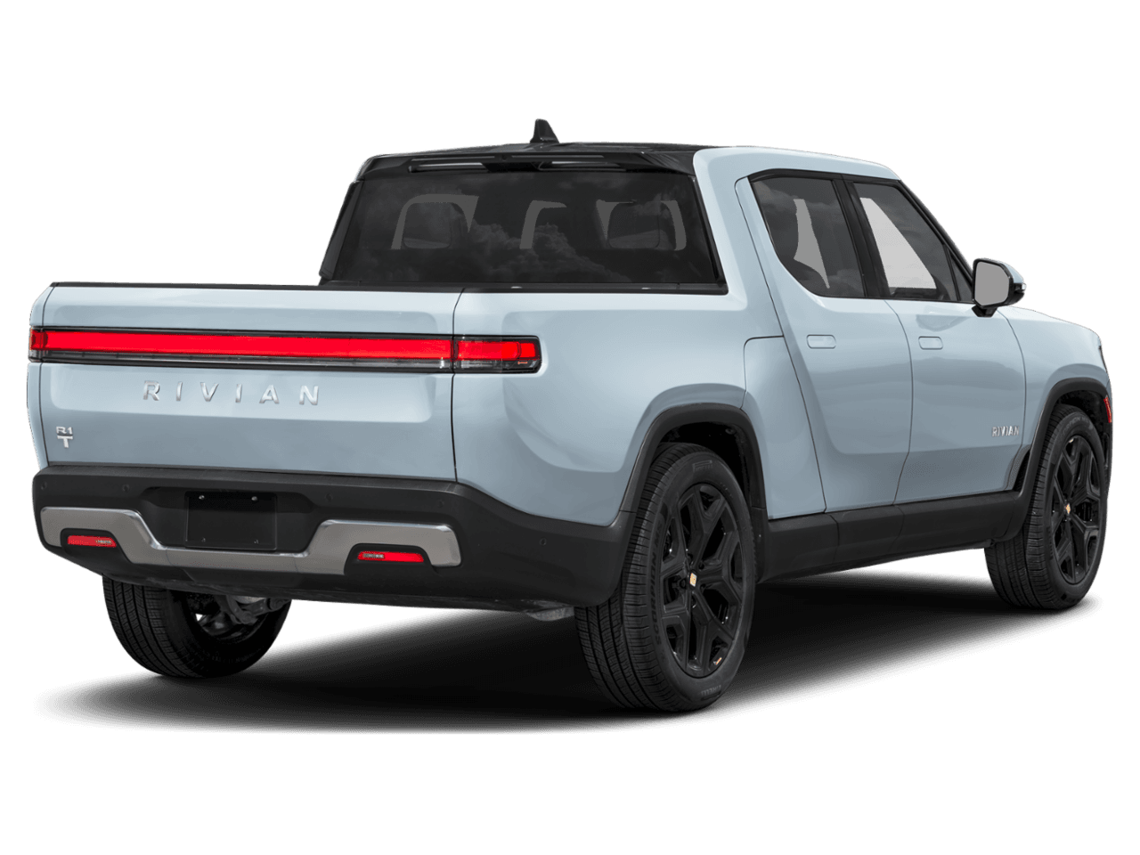 2025 Rivian R1T Adventure - Rear 3/4, facing to the right