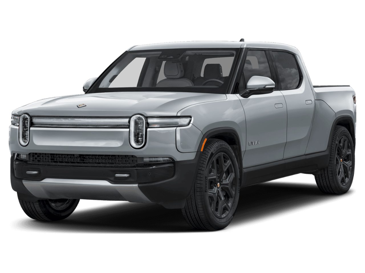 2025 Rivian R1T Adventure - Front 3/4, facing to the left