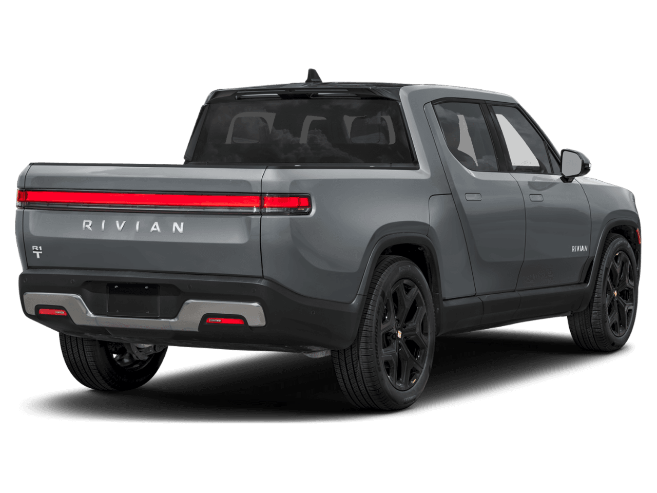 2025 Rivian R1T Adventure - Rear 3/4, facing to the right