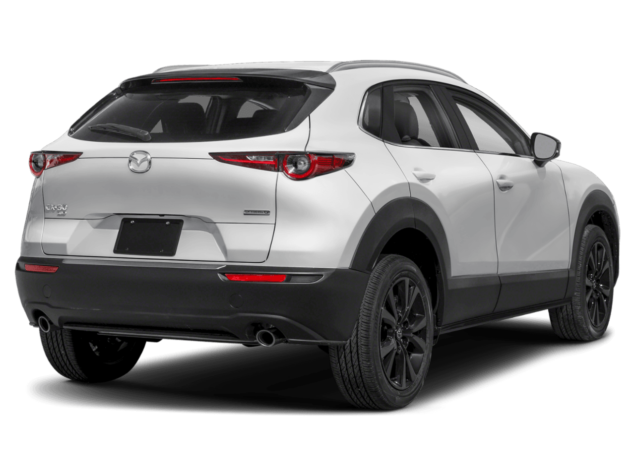 2025 Mazda CX-30 2.5 S Select Sport - Rear 3/4, facing to the right