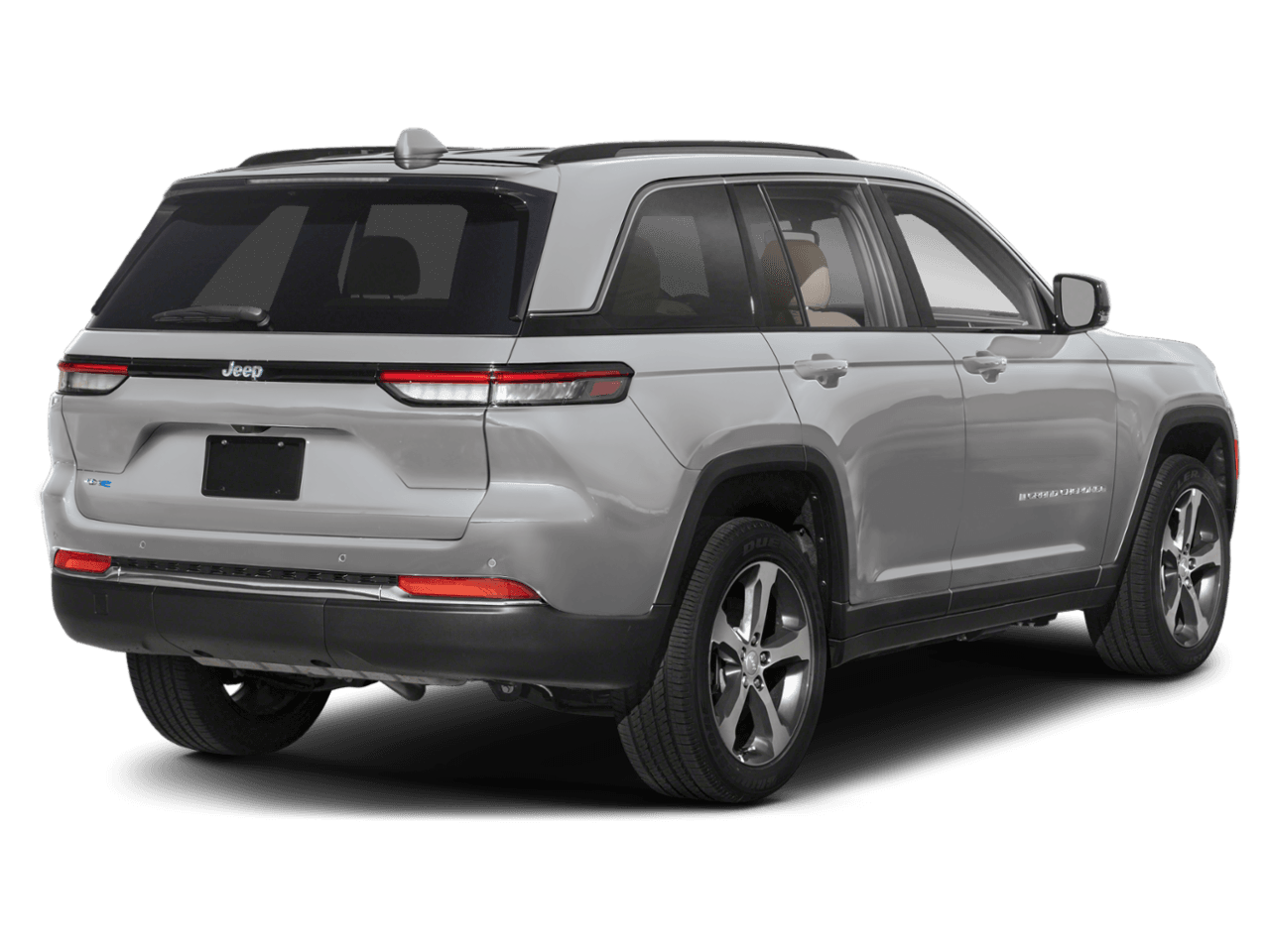 2025 Jeep Grand Cherokee 4xe Trailhawk - Rear 3/4, facing to the right