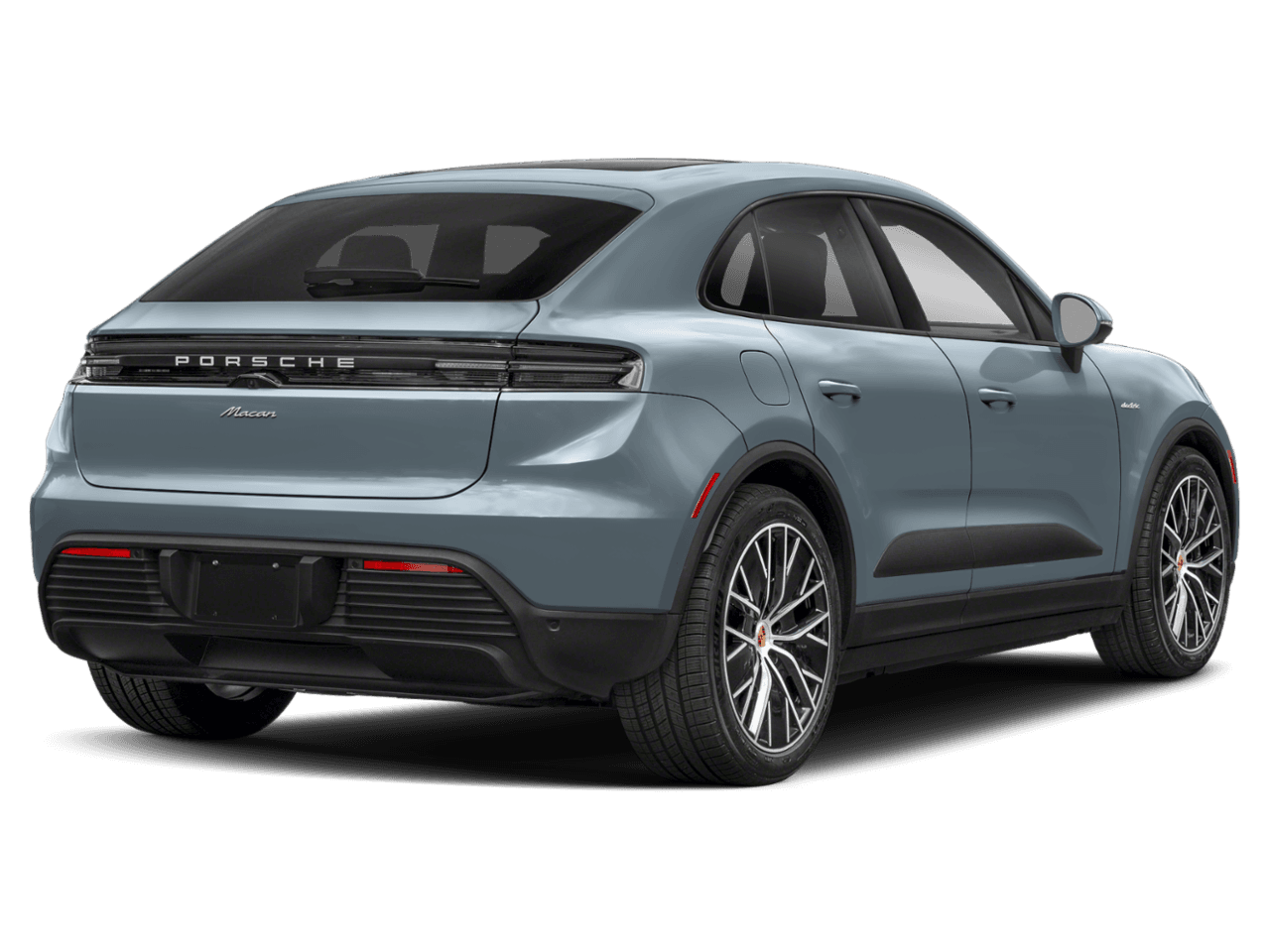 2025 Porsche Macan Electric 4 - Rear 3/4, facing to the right