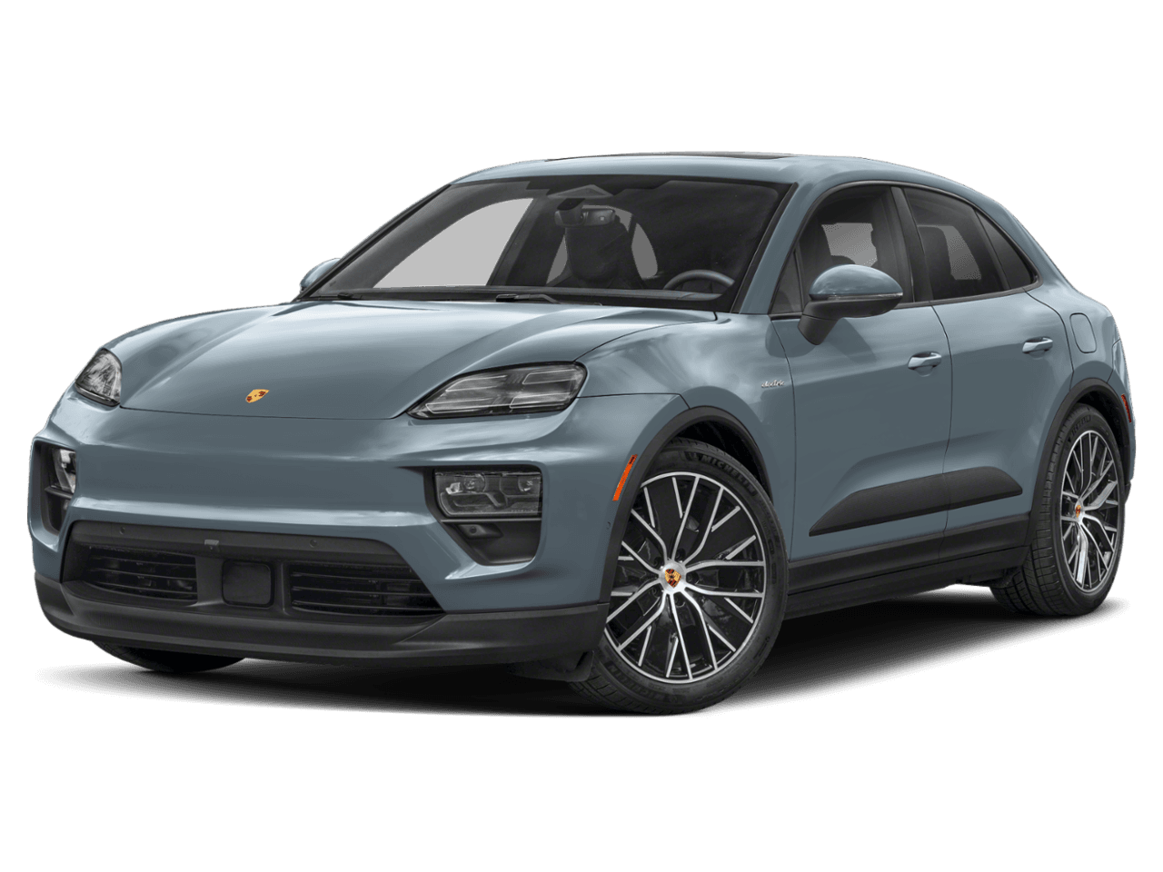 2025 Porsche Macan Electric Turbo - Front 3/4, facing to the left