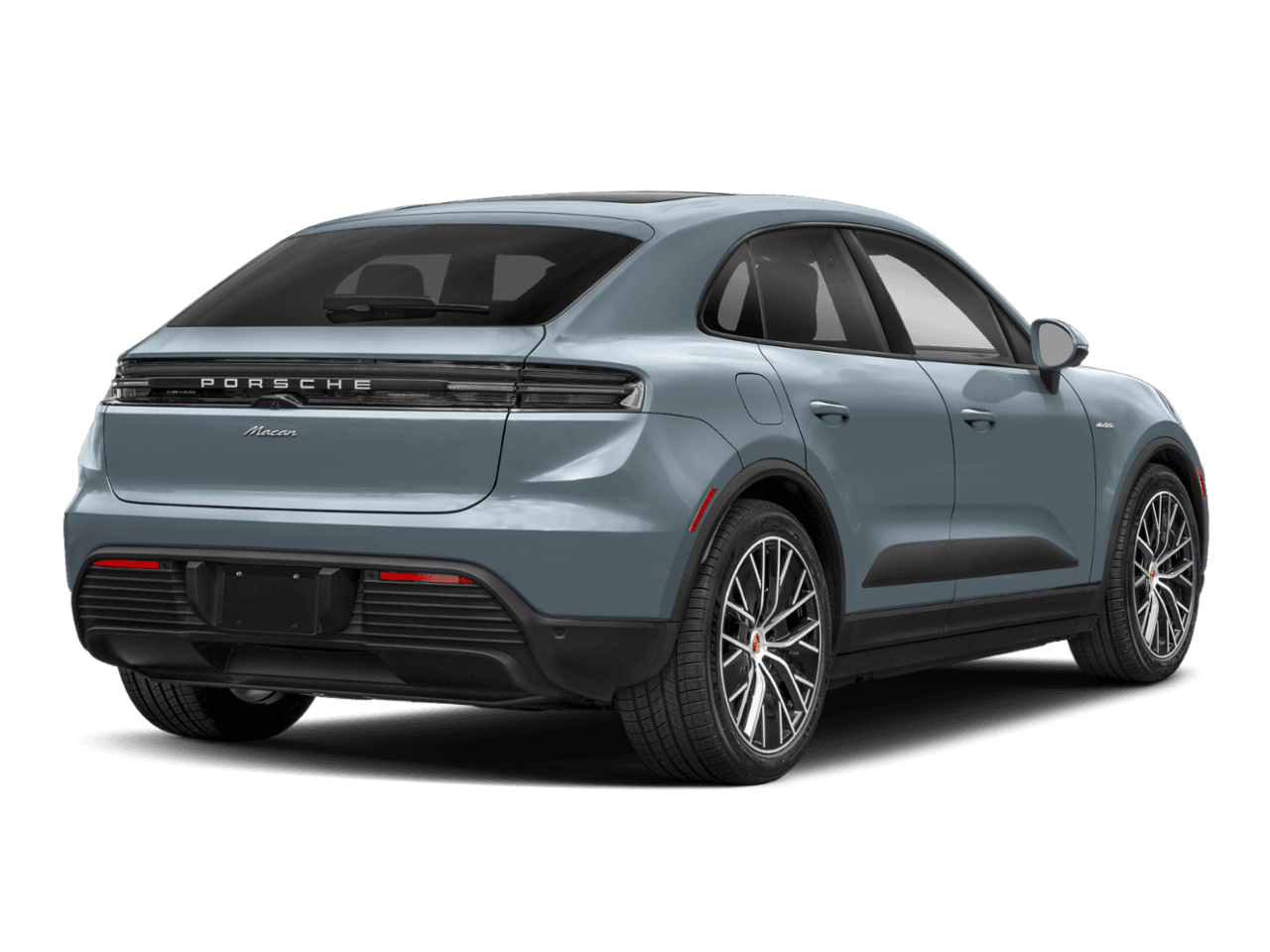 2025 Porsche Macan Electric Turbo - Rear 3/4, facing to the right