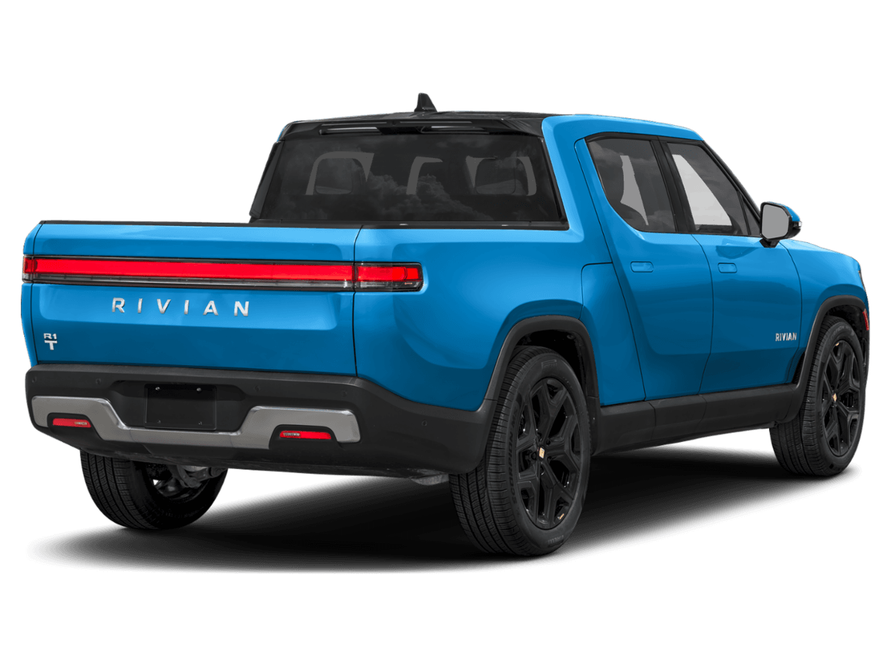 2025 Rivian R1T Ascend - Rear 3/4, facing to the right