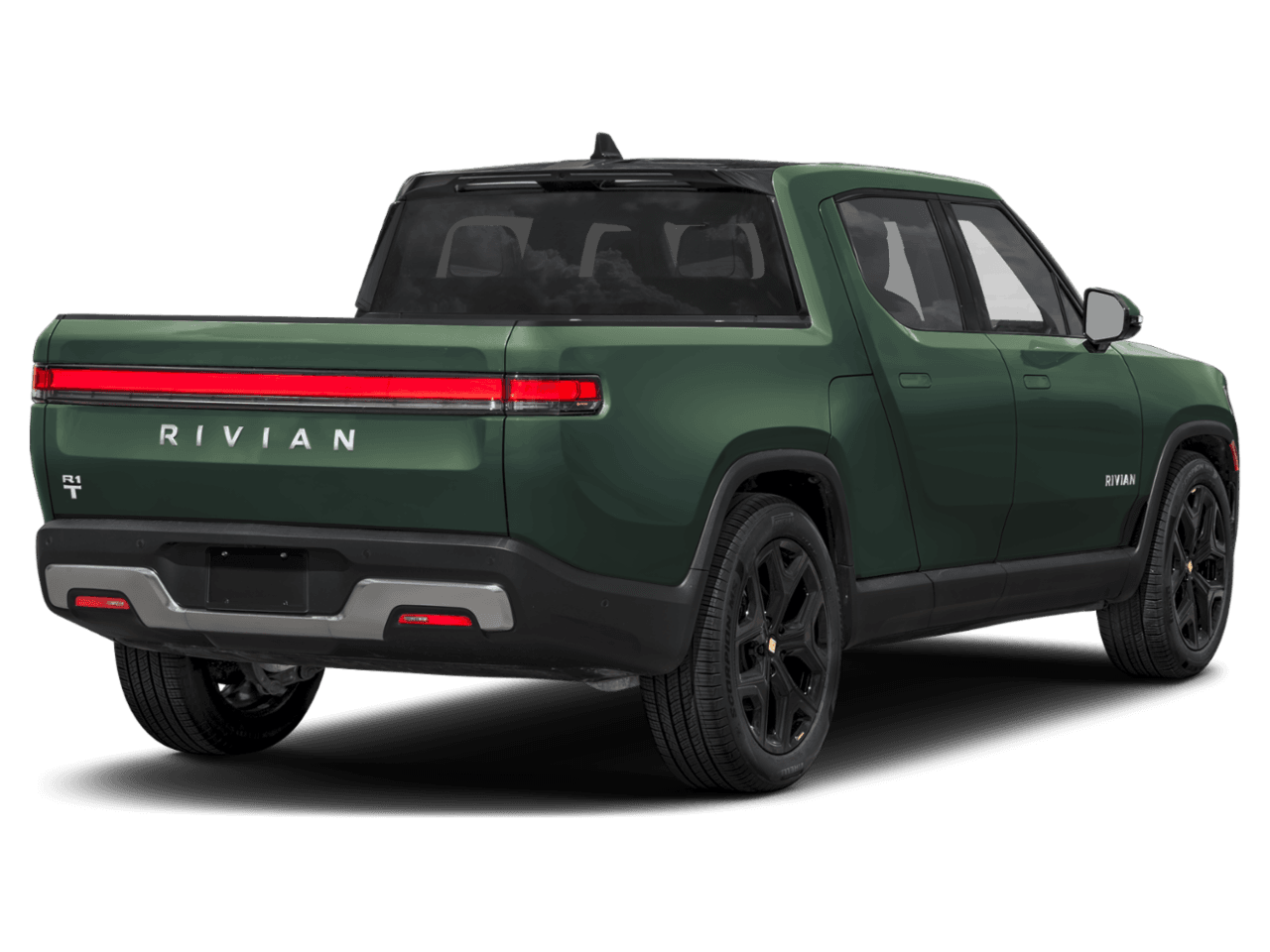 2025 Rivian R1T Ascend - Rear 3/4, facing to the right