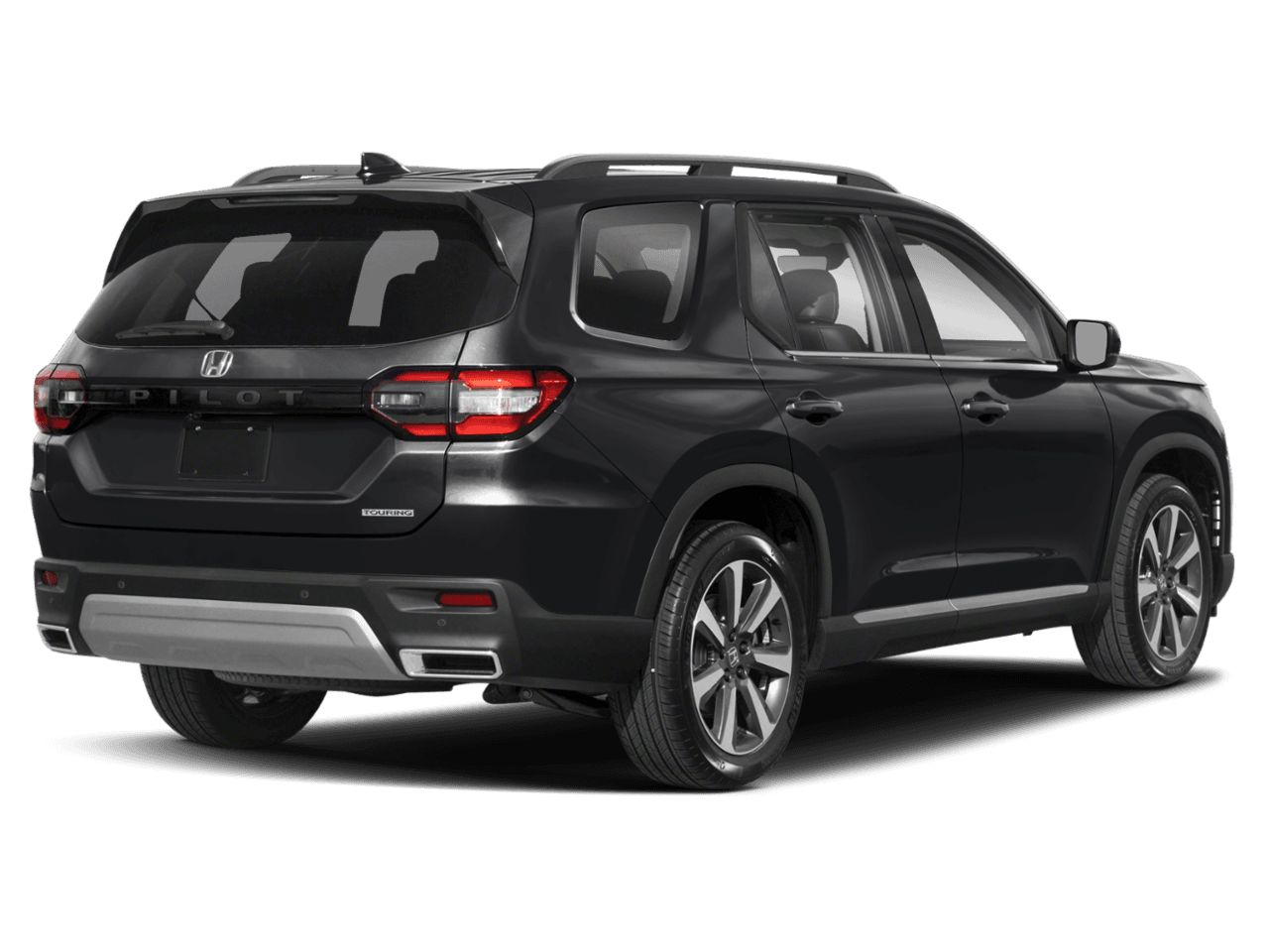 2025 Honda Pilot Touring+ - Rear 3/4, facing to the right