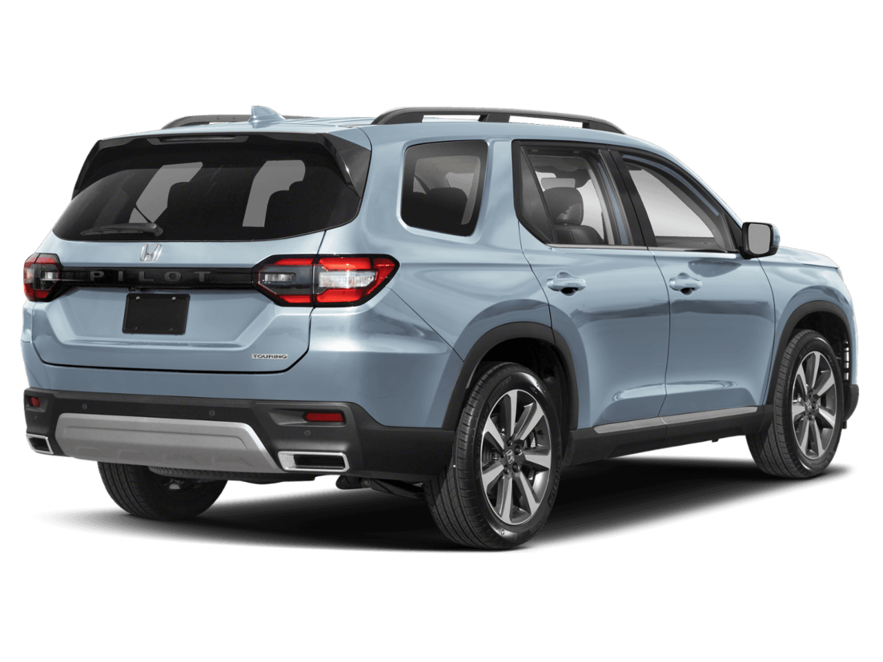 2025 Honda Pilot Touring+ - Rear 3/4, facing to the right