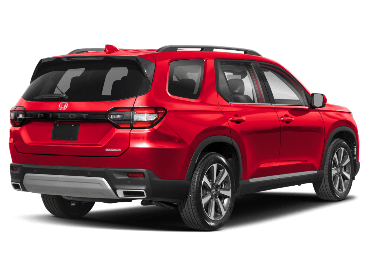 2025 Honda Pilot Touring+ - Rear 3/4, facing to the right
