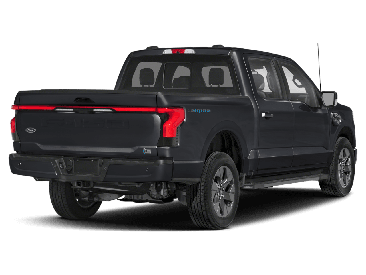 2025 Ford F-150 Lightning LARIAT - Rear 3/4, facing to the right
